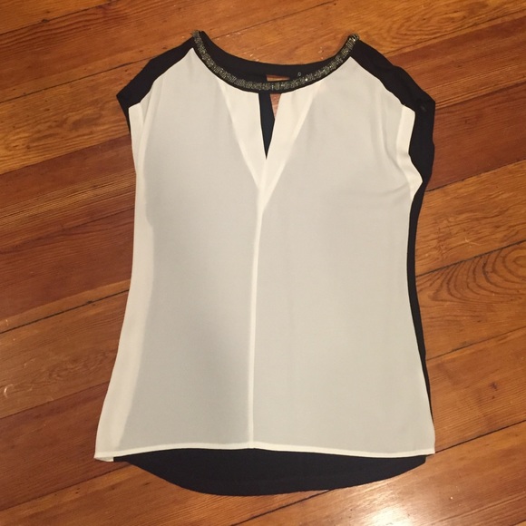 Black and white blouse with beaded neckline