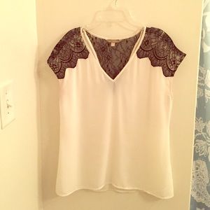 Lace and silk cream tee for day-to-night.