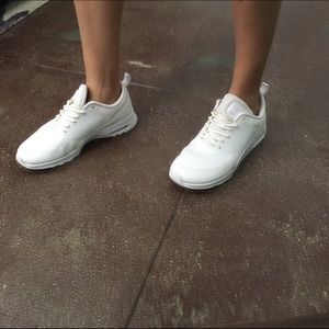 All white NIKE Air Force One Thea's