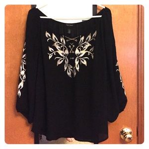 Black and embroidered semi-sheer top