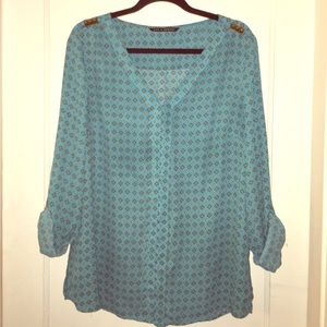 Turquoise long sleeved blouse with gold patterning
