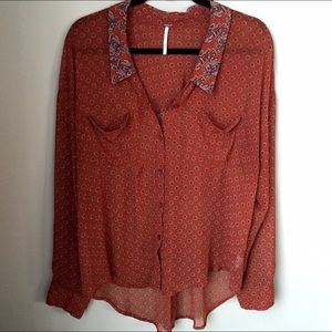 Rust colored sheer Free People top (L)