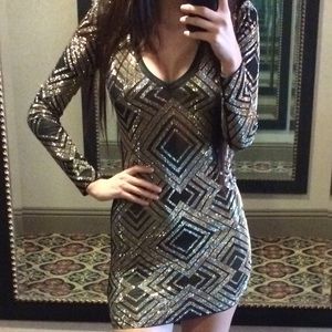 Black long sleeve dress w gold studs. Size Small.