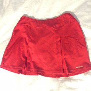 Pleated red tennis/golf skort.