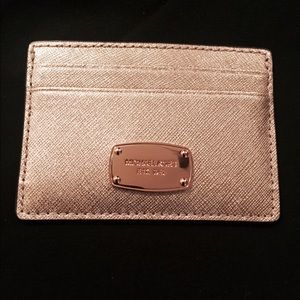 Authentic Michael Kors rose gold card holder