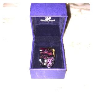 Swarovski Purple ring with gold band.