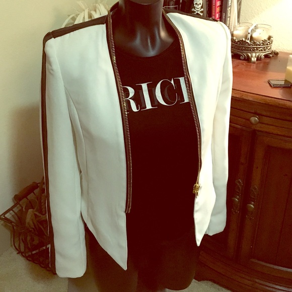 White blazer with black trim