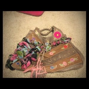 Brand name Consuela bag.