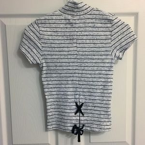 Striped turtleneck, with lace up back