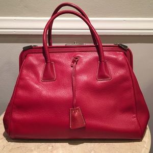 Red Prada leather purse.
