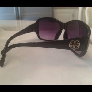 Tory Burch Black sunglasses with gold symbol