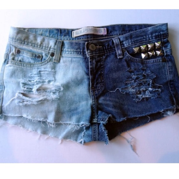 Hand distressed and altered denim jean cut offs