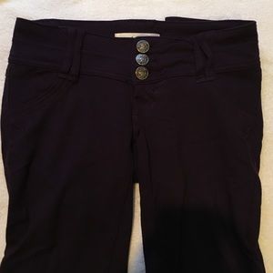 Dark purple jeggings.