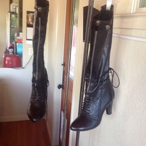 Black leather boots by Miz Mooz