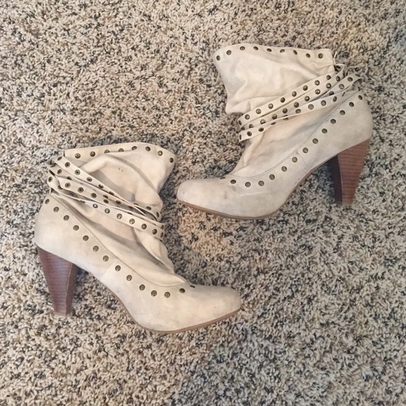 Cream heeled booties with straps
