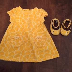 Baby girl matching dress and shoes.