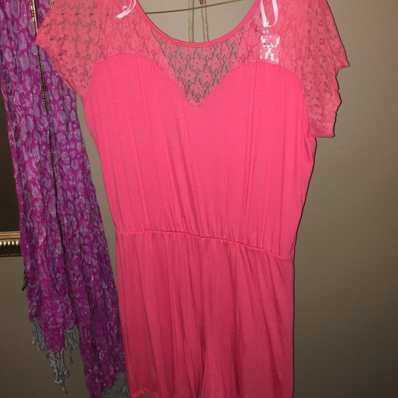 Cute coral romper!! Never worn with tag XL
