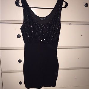 Black short party dress with sequin top