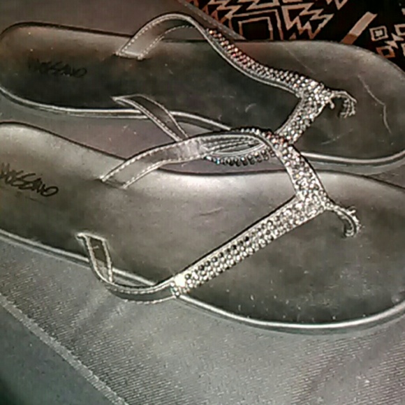 Black bling Thong sandals .