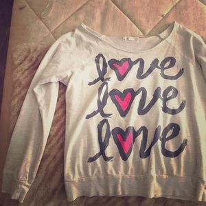 Off the shoulder sweater.