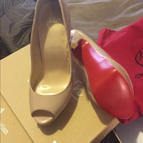 Red bottom New size 8 but fits like a 7 1/2