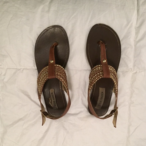 Brown Steve Madden sandals with gold detailing