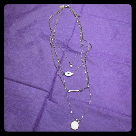 4 layered evil eye, arrow, triangle pendant