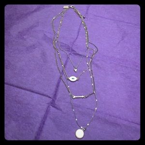 4 layered evil eye, arrow, triangle pendant