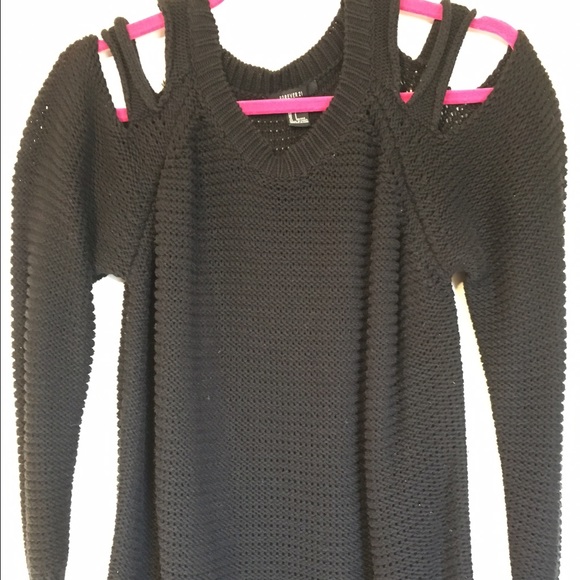 Sweater with shoulder cut outs