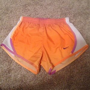 Purple/orange dri-fit Nike shorts