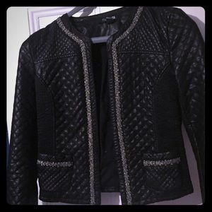 Quilted vegan leather with embellishment