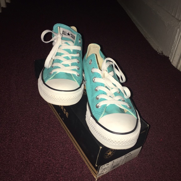 Slightly worn Teal Converse Size 6 Men , 8 Womens