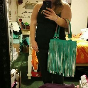 Extra pictures of the fringe steve madden handbag