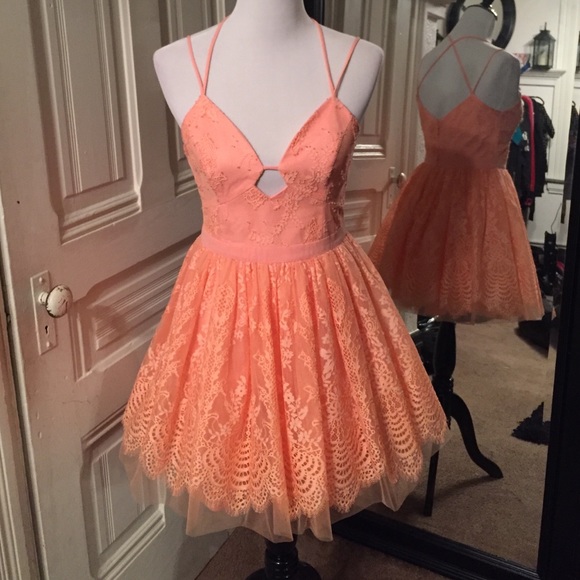 bebe Dresses & Skirts - lace special occasion fit and flare dress