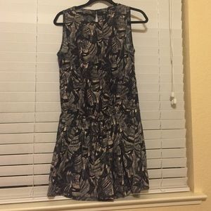 H&M romper with an open back slit