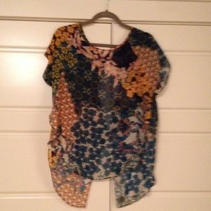 Backless, see through shirt.