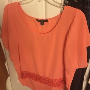 Flowy coral short sleeve shirt. Living doll.