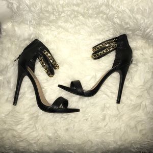 Black heels with gold chains