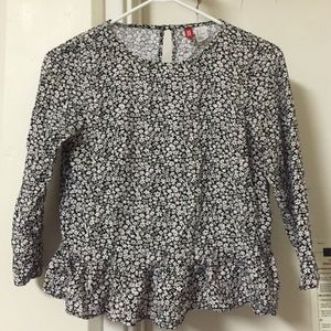 Black, pink, and white floral peplum top