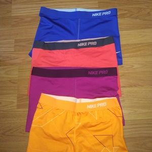 4 pairs of Nike Pro Compression Shorts