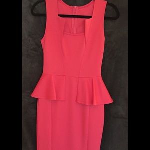 Peplum style dress. Size 4. Excellent condition.