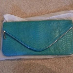 Clutch bag turquoise gold zip front