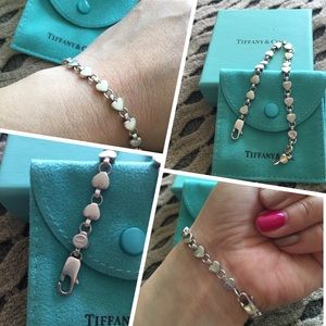 Sterling silver linked hearts bracelet