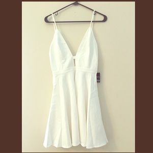 White revolve dress