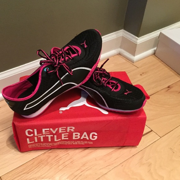 Black and pink Pumas