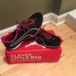 Black and pink Pumas