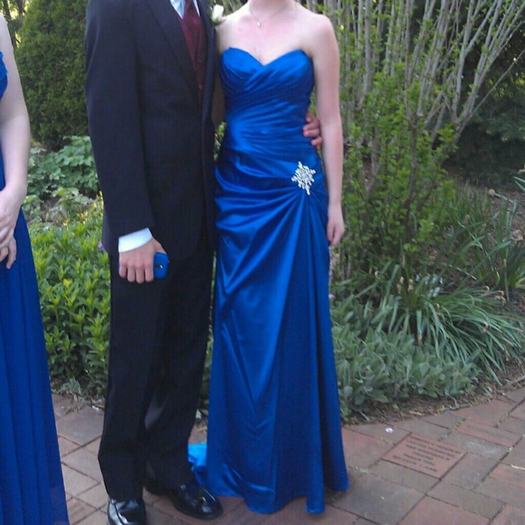 Strapless prom dress with short trail