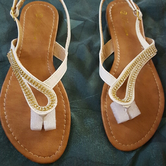 White and gold flat sandals