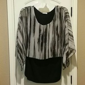 THIS TOP IS FOR SALE! LISTED AS "SOLD" BUT ITS NOT