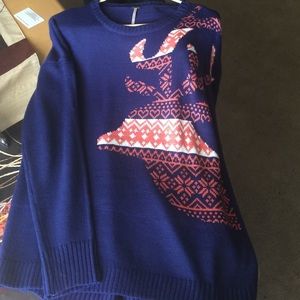 Worn once. Long sleeve sweater